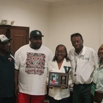 V Club supporters receiving an award
