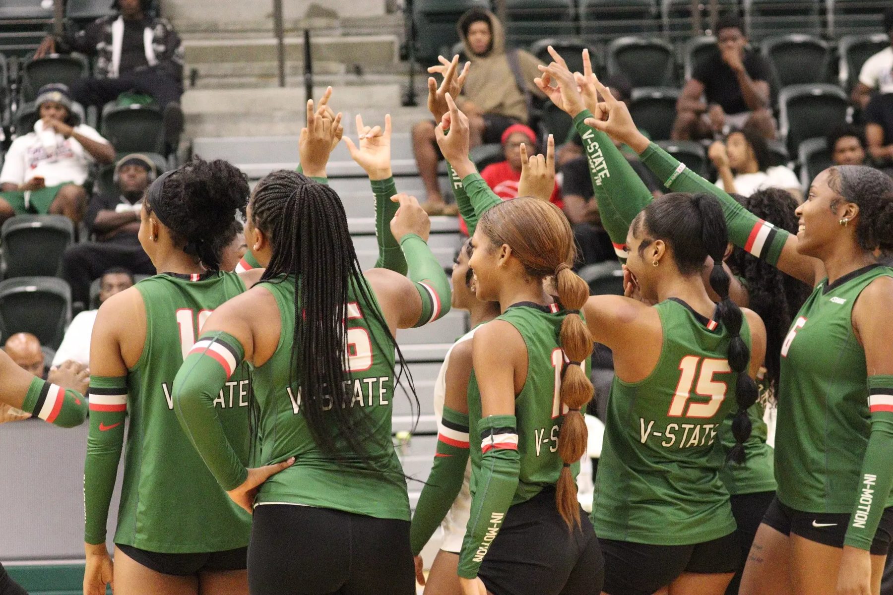 MVSU volleyball team huddled together
