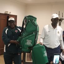 V Club supporters with a V Club golf bag