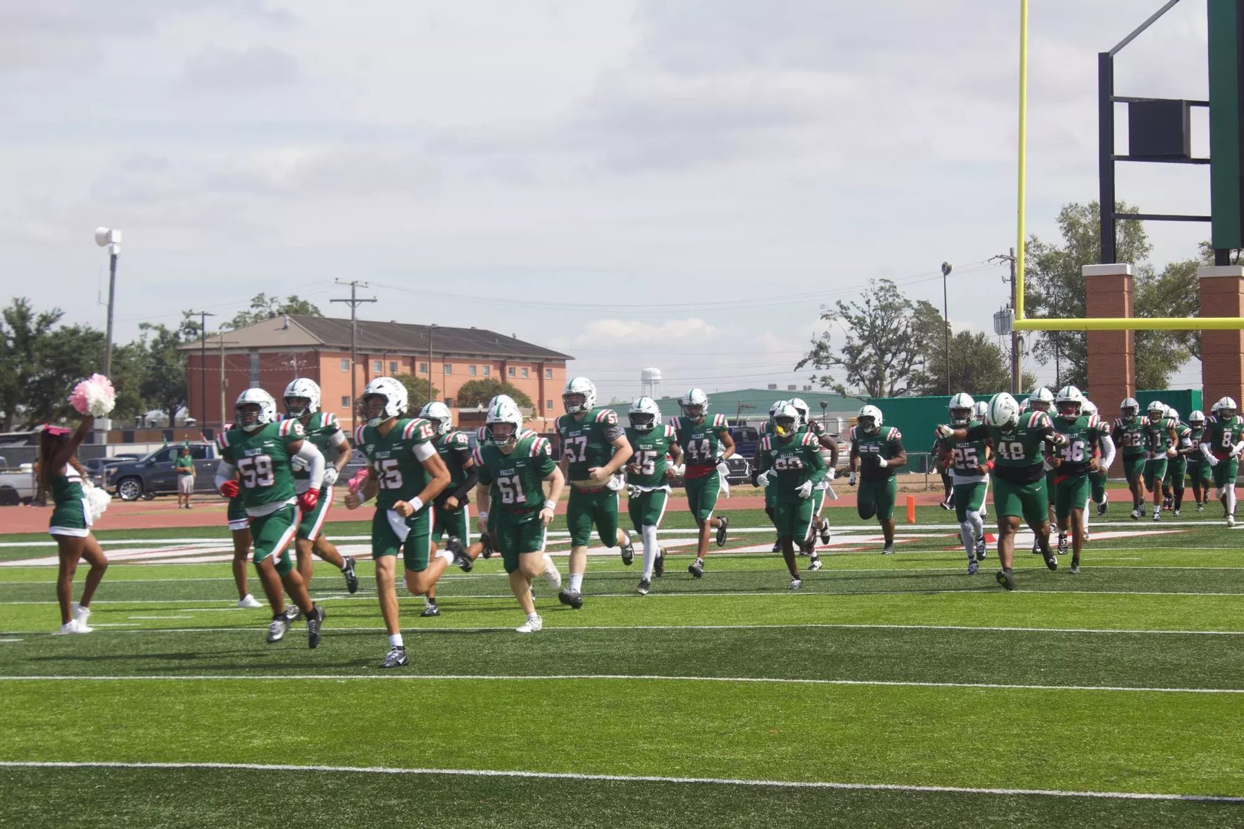 MVSU football team taking the field